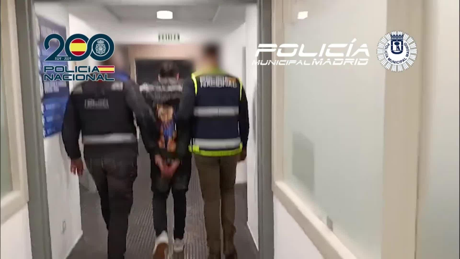 J012-IMAGENES POLICIA DETENIDO FUGITIVO HONDUREÑO