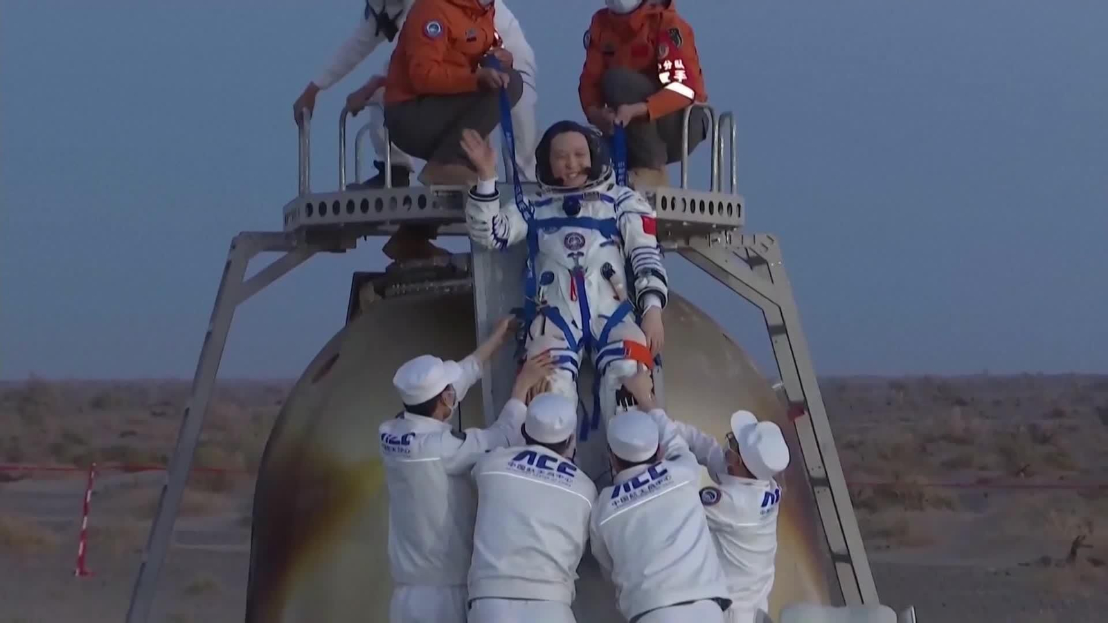 va china astronautas regreso