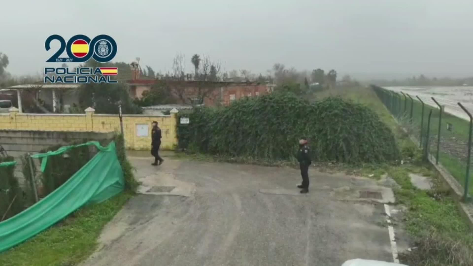 M059-IMAGENES POLICIA REGRESO DESALOJADOS CORDOBA