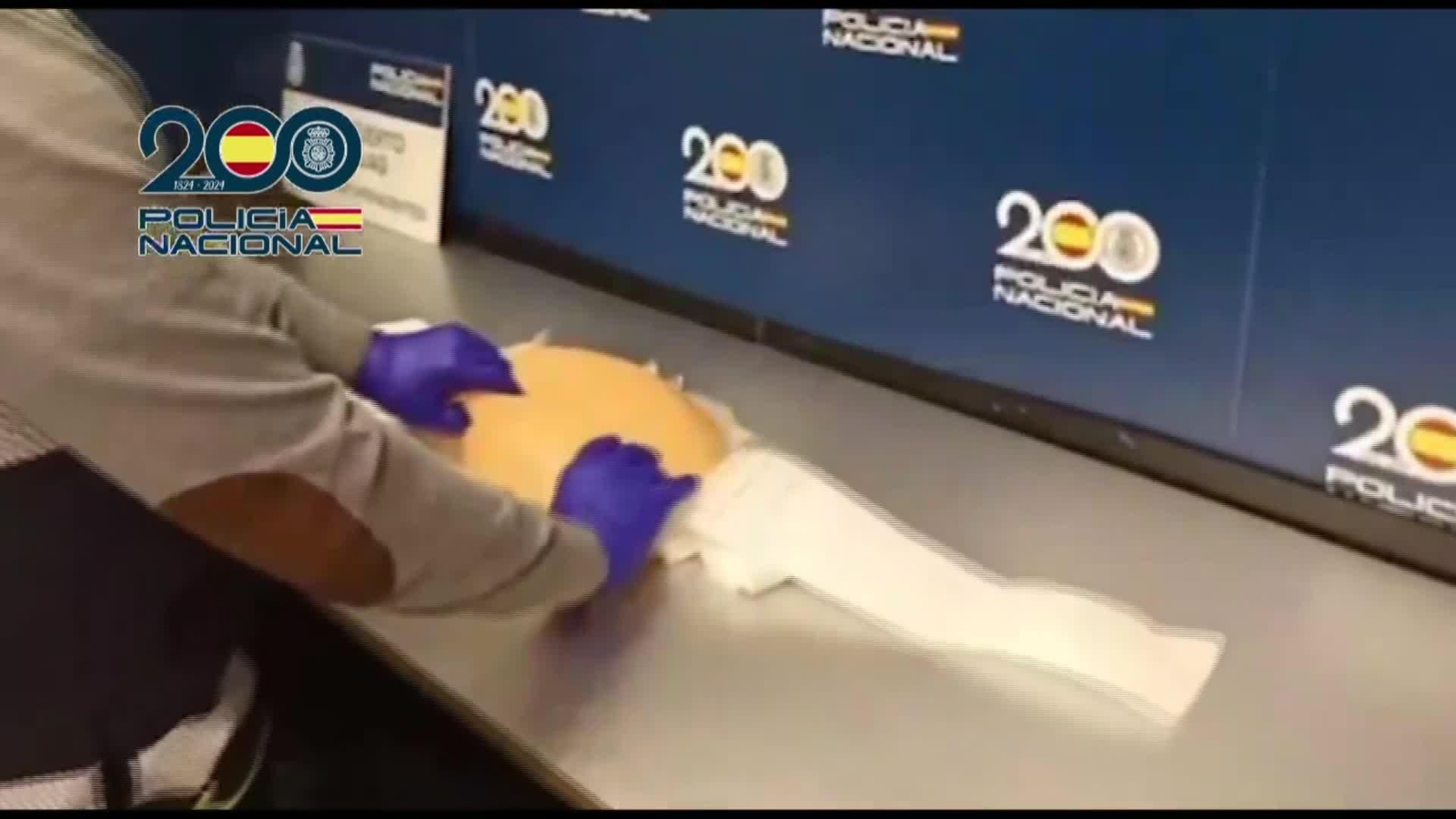 M011-IMAGENES POLICIA FALSA EMBARAZADA DROGA