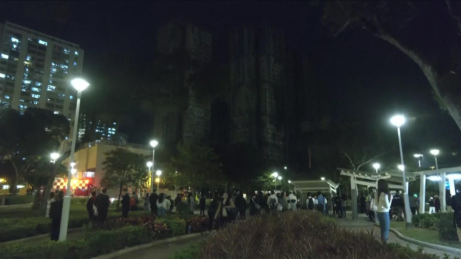 V072-CHINA VIGILIA POR LOS FALLECIDOS EN EL EDIFICIO DE HONG KONG