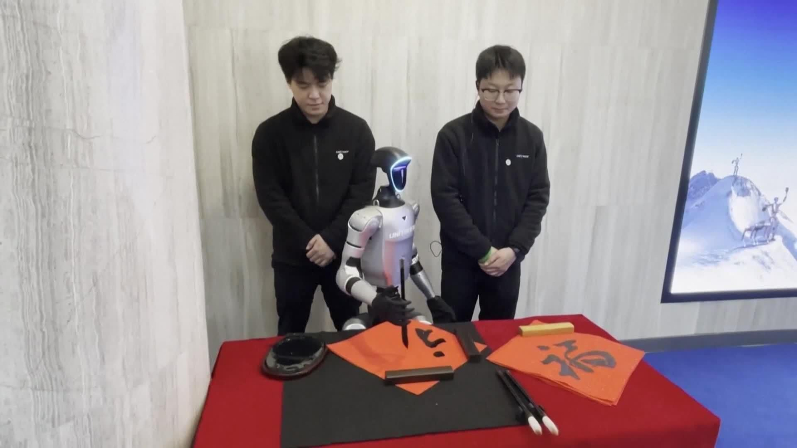 va robots bienvenida canciller aleman a china