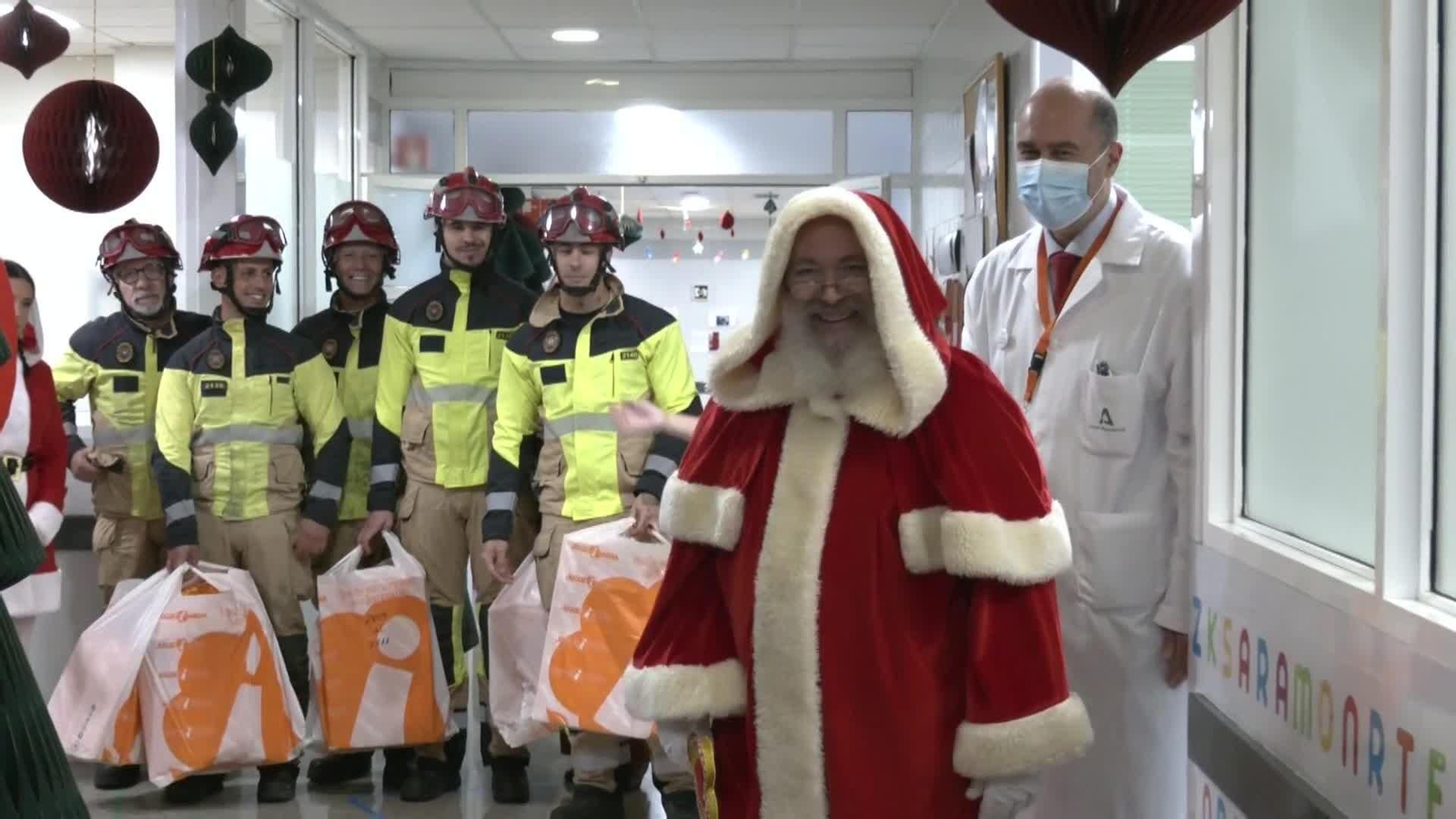 va visita bomberos hospital