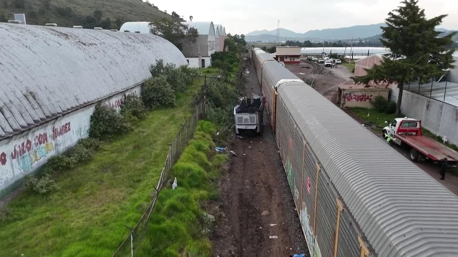 M004-MEXICO ACCIDENTE AUTOCAR ARROLLADO POR TREN